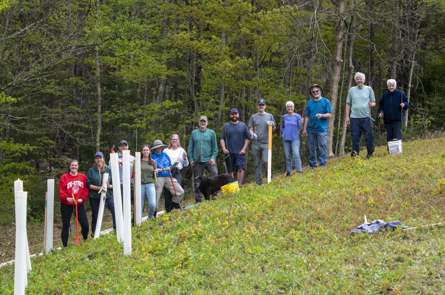 The Stout family gathered for tree planting