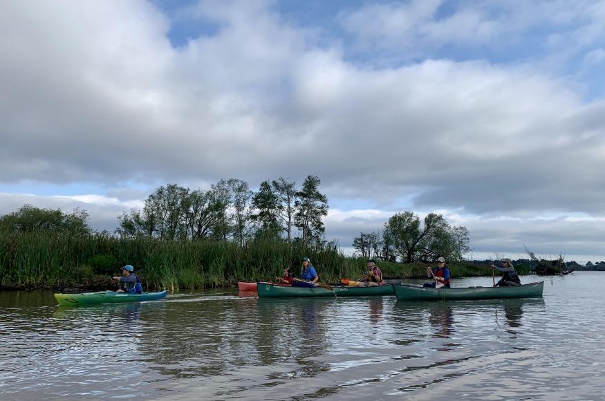 Canoers and kayakers in Allouez Bay