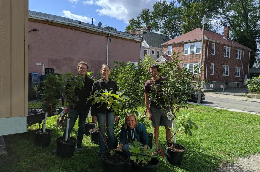 A group of people with trees